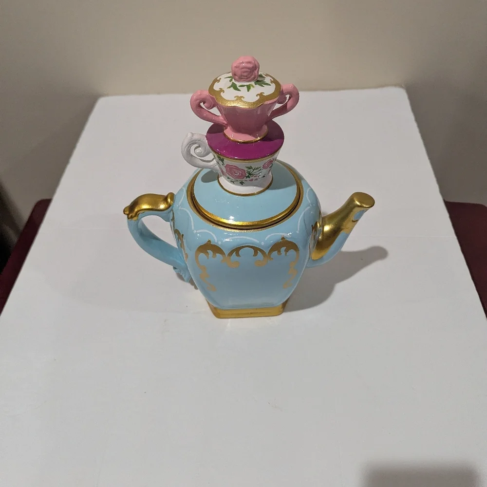 Alice In Wonderland, Elegant Blue and Gold Teapot with Pink Floral Lid 11"X9" - Picture 3 of 13
